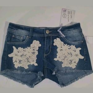 Almost famous shorts new with tags size 7 floral